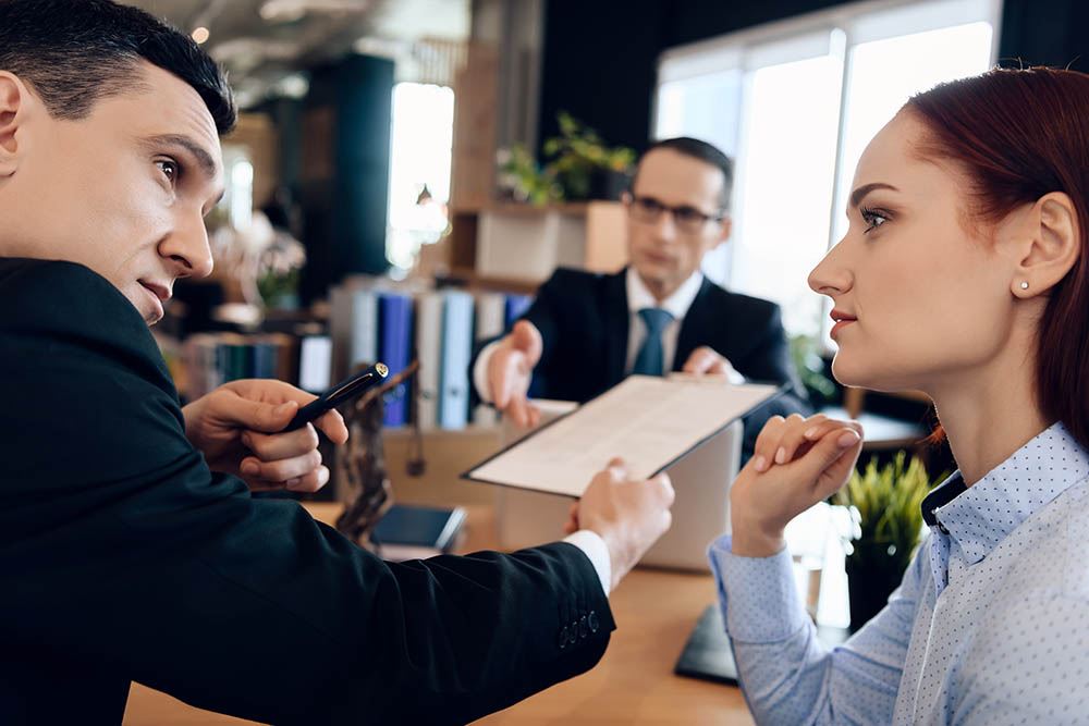 divorcing couple with paperwork