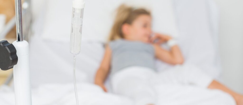 child in a hospital bed